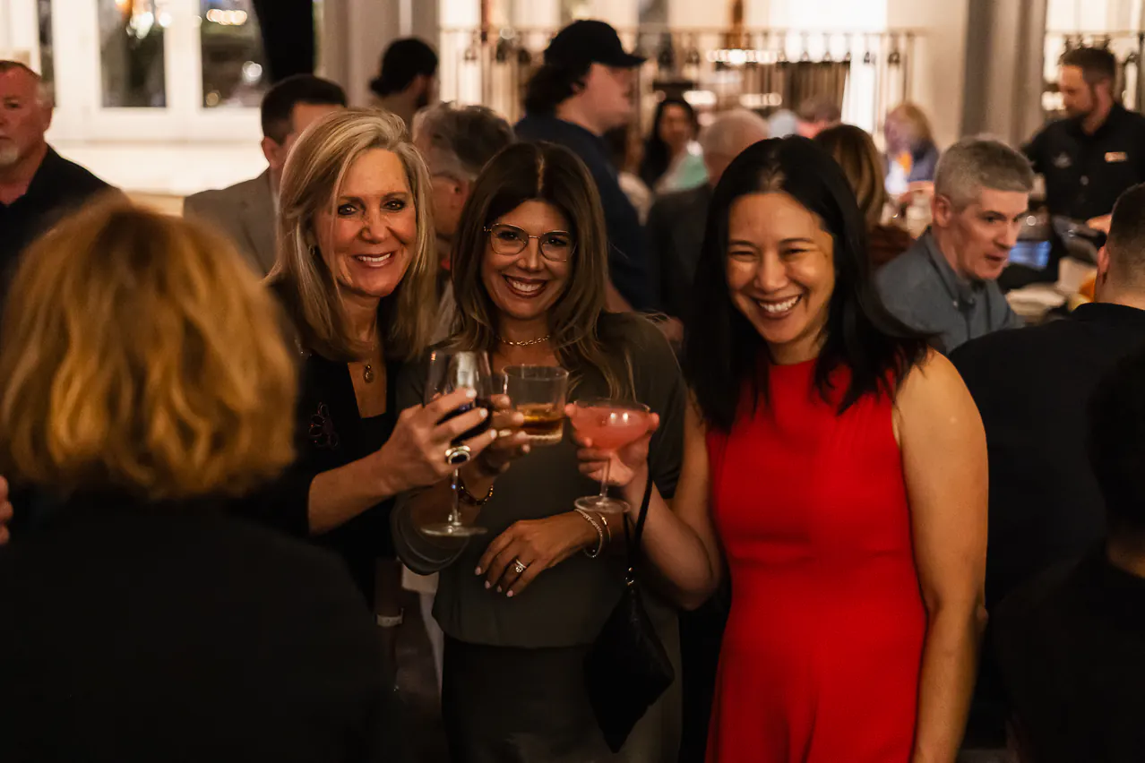 Palooza attendees connecting at an evening reception